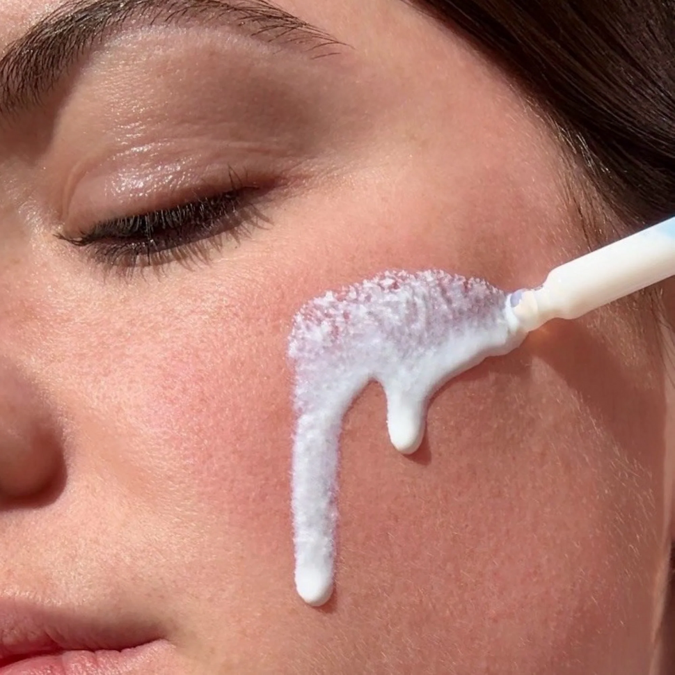 Zonnebescherming met minerale filters serum SPF 50